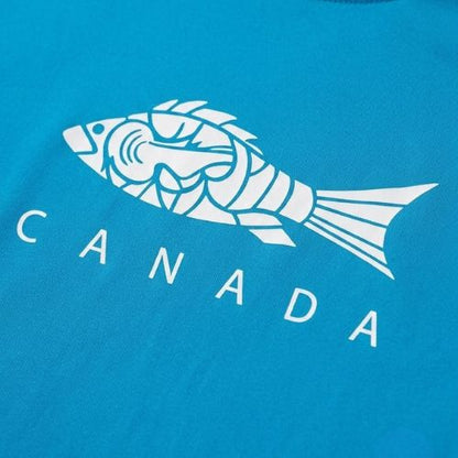 A white stylized fish graphic printed on bright blue fabric, angled above the bold capital word CANADA.